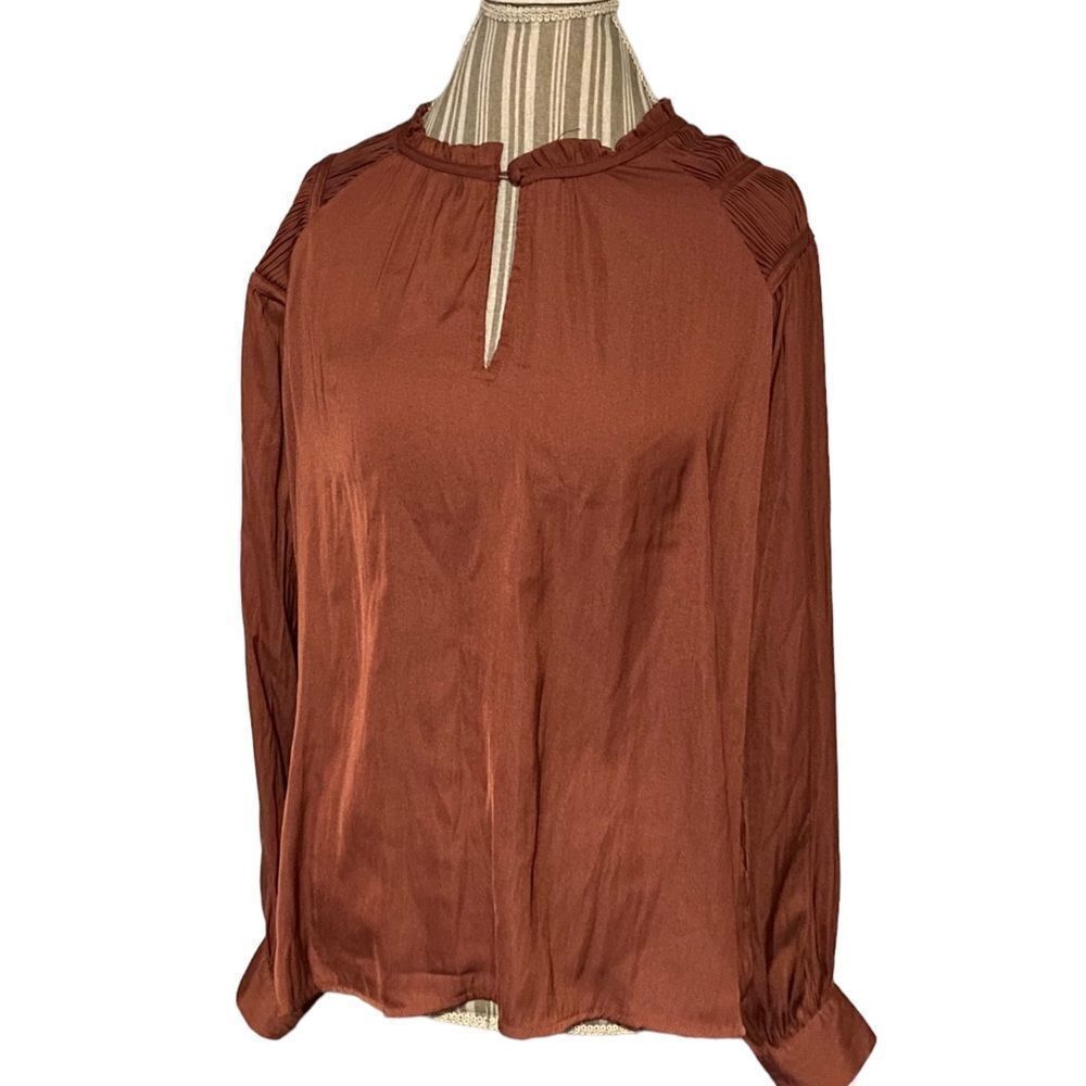The limited size large stylish blouse new with tags $59.50